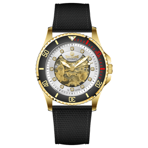 Branded wrist watch for men in pakistan. A gold-toned Monarch Prestige watch with a black leather band and a skeleton dial visible through the transparent case back.