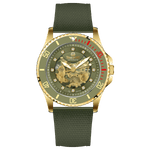 Branded wrist watch for men in pakistan. A gold-toned Monarch Prestige watch with a black leather band and a skeleton dial visible through the transparent case back.