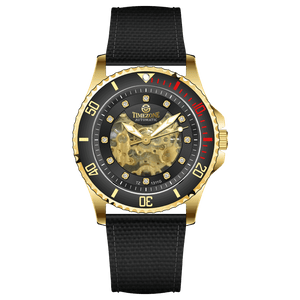 Branded wrist watch for men in pakistan. A gold-toned Monarch Prestige watch with a black leather band and a skeleton dial visible through the transparent case back.