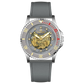 Branded wrist watch for men in pakistan. A silver-toned Monarch Luxe watch with a gray leather/cloth strap and a transparent dial showcasing the automatic movement.