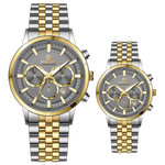 Branded couple wrist watches in pakistan. A pair of stainless steel Navitimer Aerospace watches, one with a larger dial and the other with a smaller dial, both featuring a green face, gold accents, and a two-tone band.