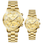 Branded couple wrist watches in pakistan. A pair of gold-toned watches with white analog dials, one large and one small, set against a black background.