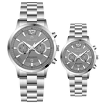 Branded couple wrist watches in pakistan. A pair of silver stainless steel watches with white dials and chronograph features.