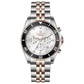 A stainless steel timezone watch with a silver dial, rose gold hands and a rose gold band. Discover timezone watches: elegant branded wrist watches for men in pakistan.