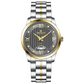 A stainless steel TimeZones watch with a silver dial, gold hands, and a stainless steel band. Discover timezone watches: elegant branded wrist watches for men in pakistan.
