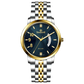 A Timezone watch with a stainless steel band and a silver dial featuring gold accents and markers. Discover timezone watches: elegant branded wrist watches for men in pakistan.