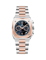 Timezone watch with rose gold and silver band on white background - branded wrist watch for men in pakistan