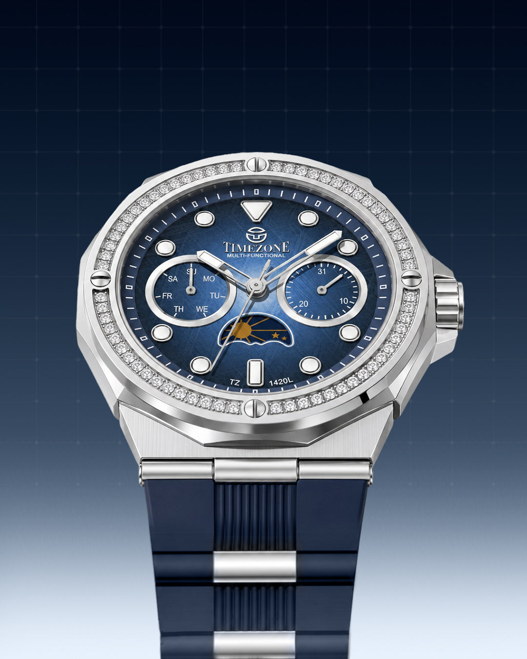 A Timezone men's watch featuring a silver stainless steel octagonal bezel with a diamond halo, a deep blue dial with moonphase indicator, and a dark blue silicone strap, set against a dark blue grid background.